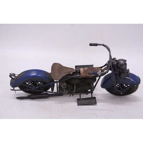 298 - A VINTAGE STYLE BLUE METAL MOTORBIKE