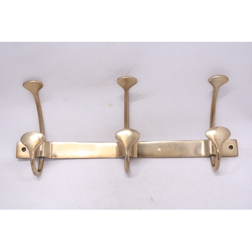 299 - A BRASS ART NOVEAU STYLE COAT RACK HANGER