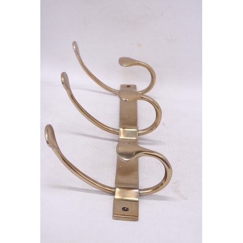 299 - A BRASS ART NOVEAU STYLE COAT RACK HANGER