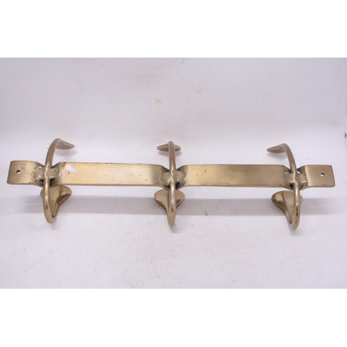 299 - A BRASS ART NOVEAU STYLE COAT RACK HANGER