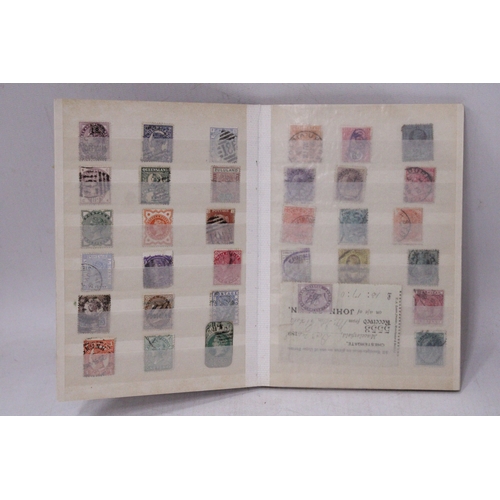 870 - A SMALL ALBUM CONTAINING VICTORIAN STAMPS