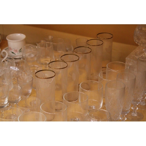 875 - A COLLECTION OF GLASSWARE DRINKING GLASSES