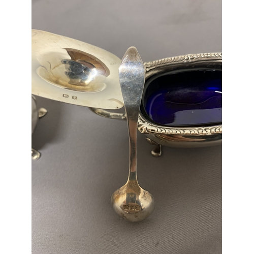 7 - A PAIR OF HALLMARKED BIRMINGHAM MUSTARD POTS WITH BLUE GLASS LINERS PLUS A PAIR OF HALLMARKED LONDON... 