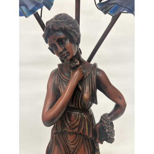 17 - A LARGE TABLE LAMP WITH THREE GLASS LIGHT SHADES AND A LADY FIGURE TO THE BASE, HEIGHT APPROX 84CM