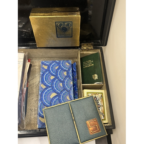 18 - A VICTORIAN EBONY GAMES BOX WITH AN INLAID MOTHER OF PEARL CHESS BOARD TO THE TOP AND BRIDGE PLAYING... 