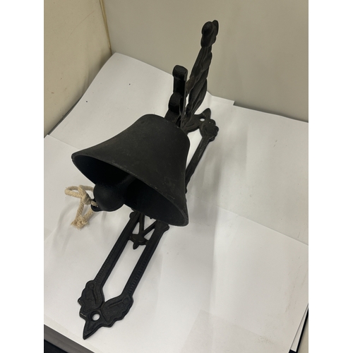 27 - A CAST COW THEMED WALL HANGING BELL, HEIGHT 36CM