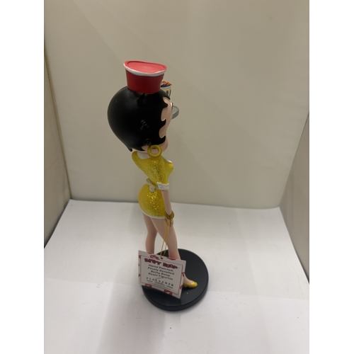 41 - A BETTY BOOP WAITRESS FIGURE IN A GOLD GLITTER DRESS, HEIGHT 29CM