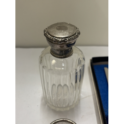 50 - FOUR PIECES OF SILVER TO INCLUDE A HALLMARKED KNIFE, GLASS SCENT BOTTLE WITH HALLMARKED LID AND GLAS... 