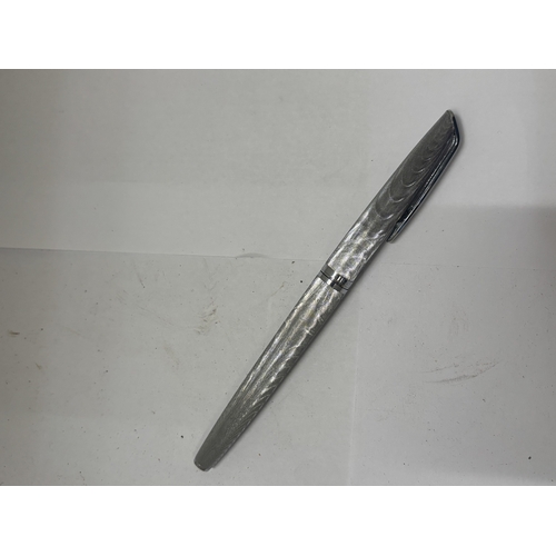 55 - A WATERMAN FOUNTAIN PEN WITH AN 18 CT GOLD NIB