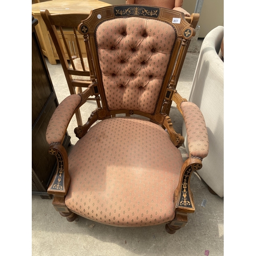 2617 - A VICTORIAN MAHOGANY LOUNGE CHAIR INSET WITH EBONISED PANELS AND FOLIATE DECORATION ON TURNED FRONT ... 