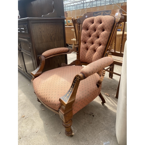 2617 - A VICTORIAN MAHOGANY LOUNGE CHAIR INSET WITH EBONISED PANELS AND FOLIATE DECORATION ON TURNED FRONT ... 