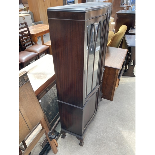 3119 - A MAHOGANY TWO DOOR DISPLAY CABINET WITH SERPENTINE FRONT, CUPBOARDS TO BASE ON BALL AND CLAW FEET, ... 