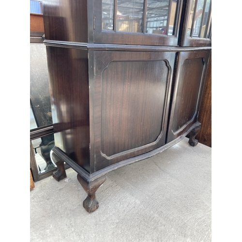 3119 - A MAHOGANY TWO DOOR DISPLAY CABINET WITH SERPENTINE FRONT, CUPBOARDS TO BASE ON BALL AND CLAW FEET, ... 