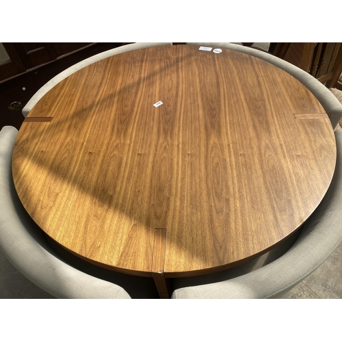 A MARK ROGERS 'DWELL' ROTUNDA, 47" DIAMETER, DINING TABLE WI...