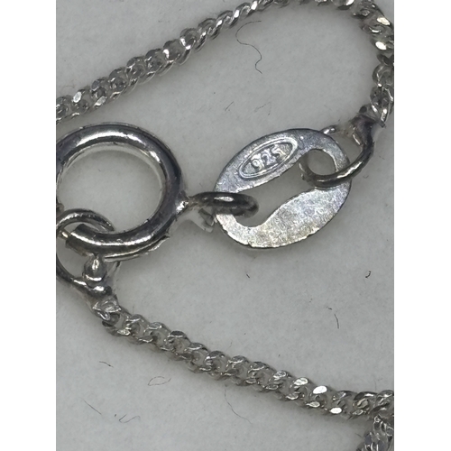 614 - A SILVER NECKALCE WITH A JADE HEART SHAPED PENDANT IN A PRESENTATION BOX`