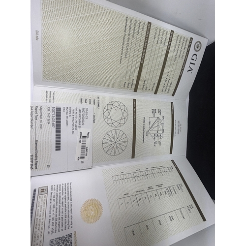 615 - A MARKED 14 CARAT GOLD RING WITH A 1 CARAT SOLITAIRE DIAMOND SIZE O IN A PRESENTATION BOX WITH GIA C... 