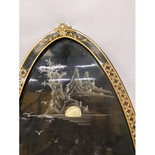 15 - A PAIR OF CHINOISERIE  BLACK LACQUER DECORATED WALL PANELS DEPICTING LADY WARRIORS WITH OVERLAID MOT... 