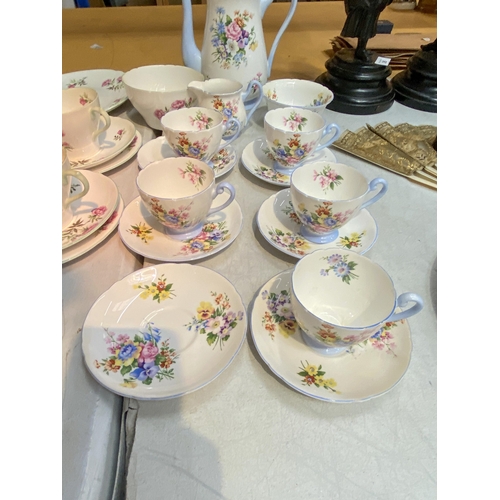 29 - A VINTAGE SUMMER BOUQUET SHELLEY PART COFFEESET TOGETHER WITH A SHELLEY EGLANTINE DESIGN PART TEASET