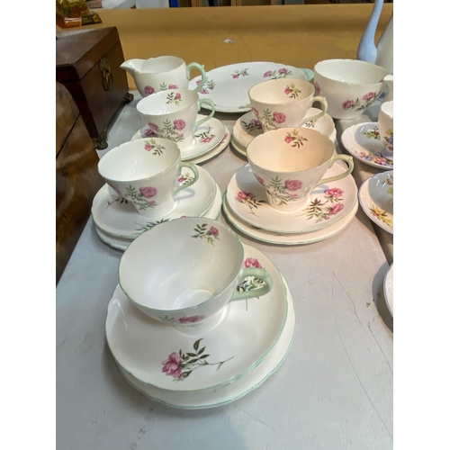29 - A VINTAGE SUMMER BOUQUET SHELLEY PART COFFEESET TOGETHER WITH A SHELLEY EGLANTINE DESIGN PART TEASET