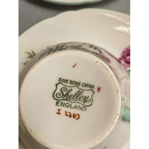 29 - A VINTAGE SUMMER BOUQUET SHELLEY PART COFFEESET TOGETHER WITH A SHELLEY EGLANTINE DESIGN PART TEASET