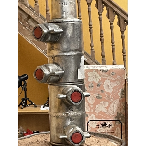 41 - A LARGE LAMP MADE UP OF VINTAGE FIRE BUCKETS AND HOSE BRANCHES
