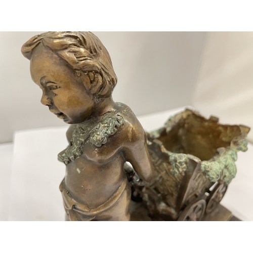 54 - A JACQUES BOUSSEAU BRONZED BOY PULLING A CART