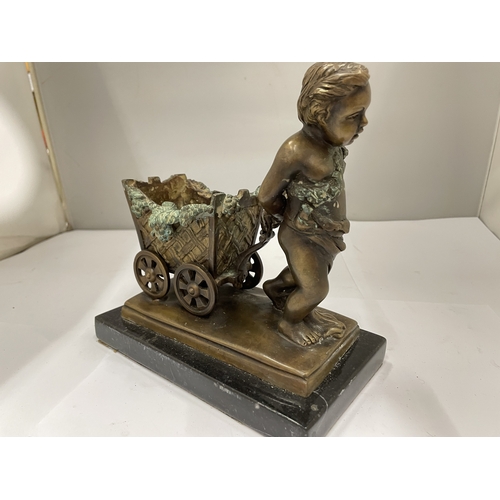 54 - A JACQUES BOUSSEAU BRONZED BOY PULLING A CART