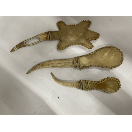 56 - THREE OLD AFRICAN VOODOO BONED RATTLES