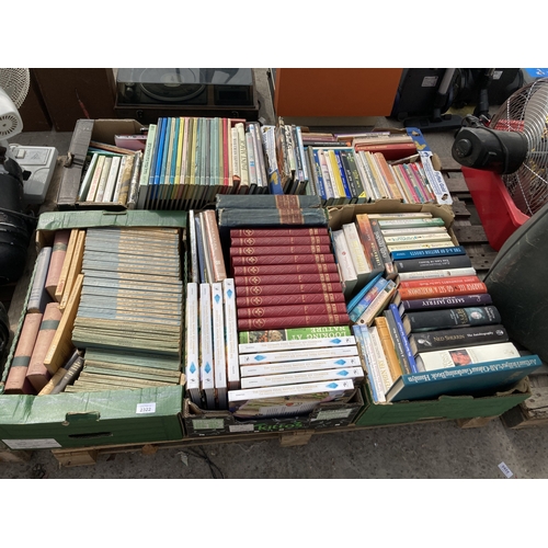 A LARGE ASSORTMENT OF BOOKS