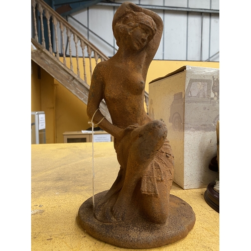 50 - A CAST IRON GARDEN STATUE OF A NUDE WOMAN, HEIGHT 32CM