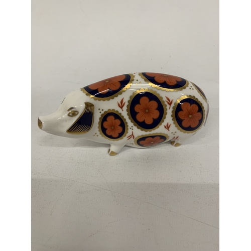 A ROYAL CROWN DERBY PIG WITH SILVER STOPPER