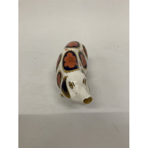 A ROYAL CROWN DERBY PIG WITH SILVER STOPPER