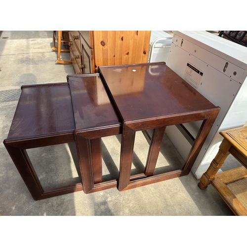 3113 - A RETRO MAHOGANY NEST OF THREE TABLES