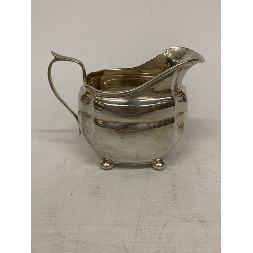 1 - A THREE PIECE HALLMARKED CHESTER SILVER TEASET TO INCLUDE A TEAPOT, CREAMER AND SUGAR BOWL - GROSS W... 