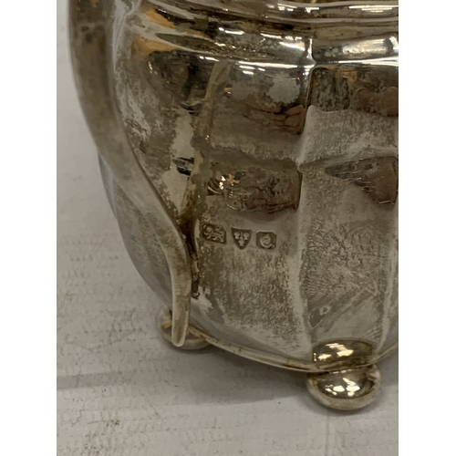 1 - A THREE PIECE HALLMARKED CHESTER SILVER TEASET TO INCLUDE A TEAPOT, CREAMER AND SUGAR BOWL - GROSS W... 