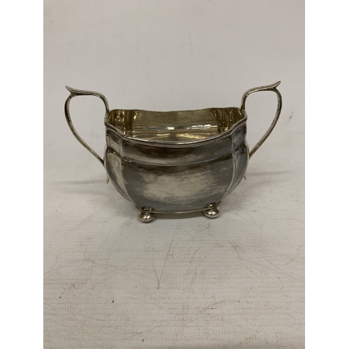 1 - A THREE PIECE HALLMARKED CHESTER SILVER TEASET TO INCLUDE A TEAPOT, CREAMER AND SUGAR BOWL - GROSS W... 
