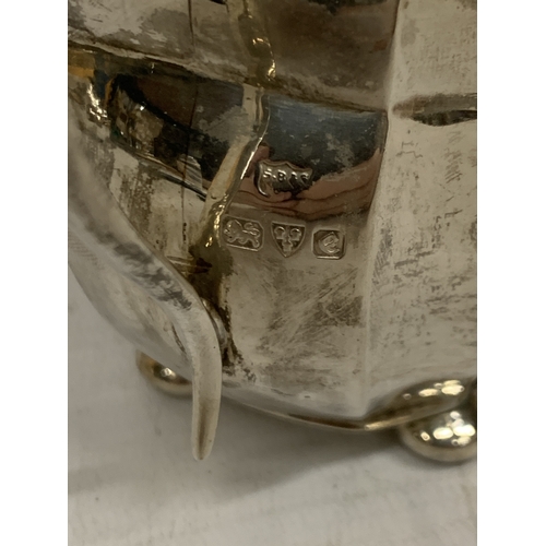 1 - A THREE PIECE HALLMARKED CHESTER SILVER TEASET TO INCLUDE A TEAPOT, CREAMER AND SUGAR BOWL - GROSS W... 