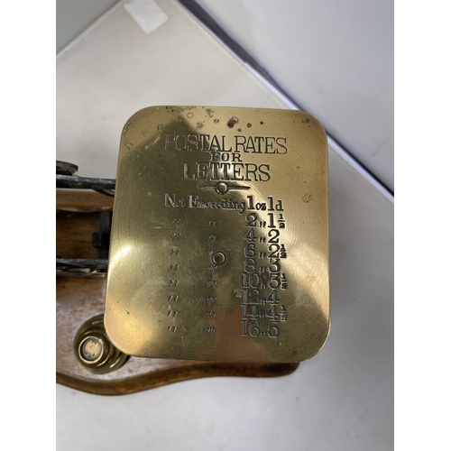 16 - A SET OF VINTAGE BRASS AND WOOD POST OFFICE SCALES WITH BRASS WEIGHTS