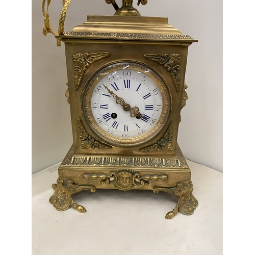 19 - A VINTAGE FRENCH ORNATE GILT CHIMING CLOCK, HEIGHT APPROX 44CM