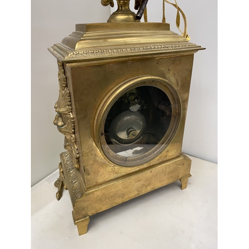 19 - A VINTAGE FRENCH ORNATE GILT CHIMING CLOCK, HEIGHT APPROX 44CM