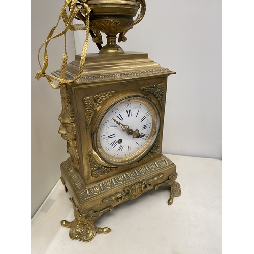19 - A VINTAGE FRENCH ORNATE GILT CHIMING CLOCK, HEIGHT APPROX 44CM