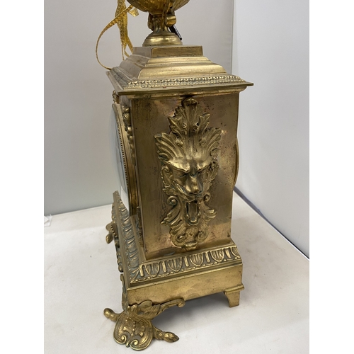 19 - A VINTAGE FRENCH ORNATE GILT CHIMING CLOCK, HEIGHT APPROX 44CM