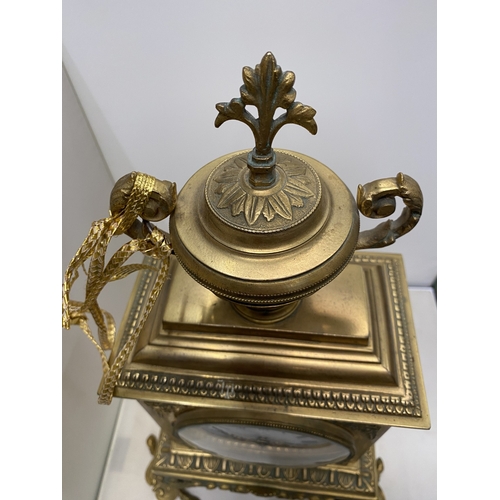 19 - A VINTAGE FRENCH ORNATE GILT CHIMING CLOCK, HEIGHT APPROX 44CM