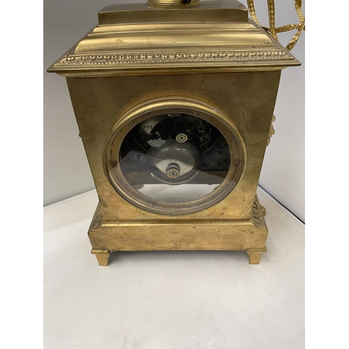 19 - A VINTAGE FRENCH ORNATE GILT CHIMING CLOCK, HEIGHT APPROX 44CM