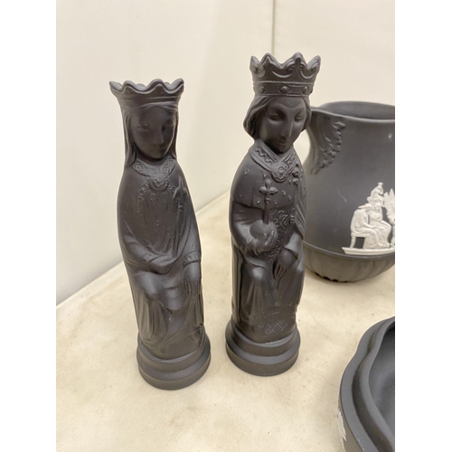 20 - A WEDGWOOD BLACK BASALT JASPERWARE CREAMER/MILK JUG TOGETHER WITH A BLACK BASALT KING AND QUEEN CHES... 