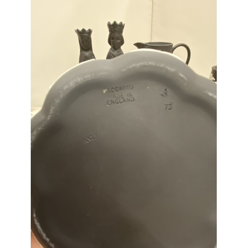 20 - A WEDGWOOD BLACK BASALT JASPERWARE CREAMER/MILK JUG TOGETHER WITH A BLACK BASALT KING AND QUEEN CHES... 