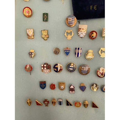31 - A LARGE QUANTITY OF CASED ENAMELLED FOOTBALL ASSOCIATED PIN BADGES