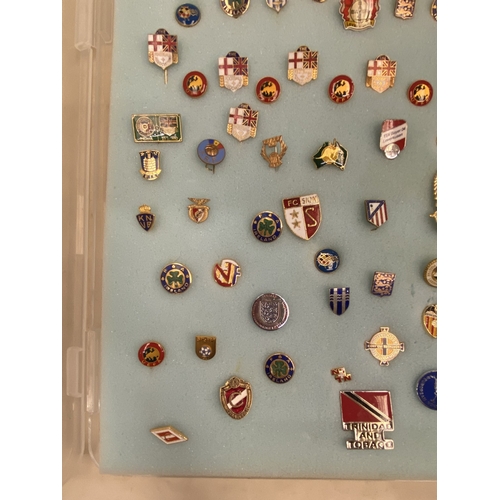 31 - A LARGE QUANTITY OF CASED ENAMELLED FOOTBALL ASSOCIATED PIN BADGES