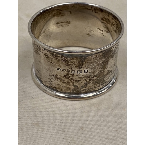 51 - THREE PIECES OF HALLMARKED SILVER TO INCLUDE A BIRMINGHAM NAPKIN RING AND TWO SHEFFIELD SPOONS