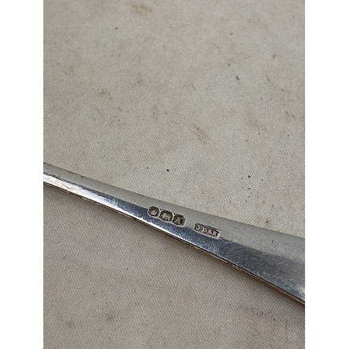 51 - THREE PIECES OF HALLMARKED SILVER TO INCLUDE A BIRMINGHAM NAPKIN RING AND TWO SHEFFIELD SPOONS
